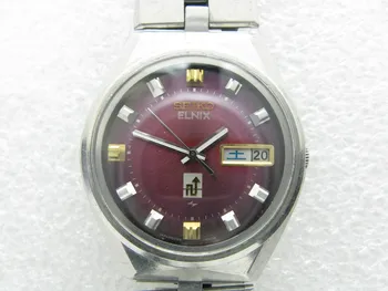 Кварцевые часы Seiko с электрическим маятником и розовым циферблатом